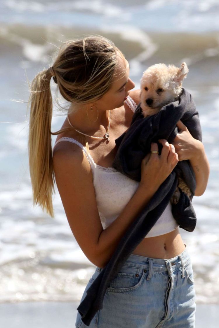 Alexis Ren Spotted At The Beach With Her Puppy In Malibu