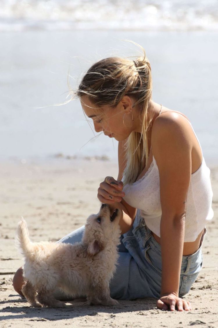 Alexis Ren Spotted At The Beach With Her Puppy In Malibu