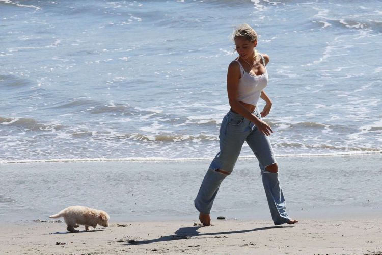 Alexis Ren Spotted At The Beach With Her Puppy In Malibu