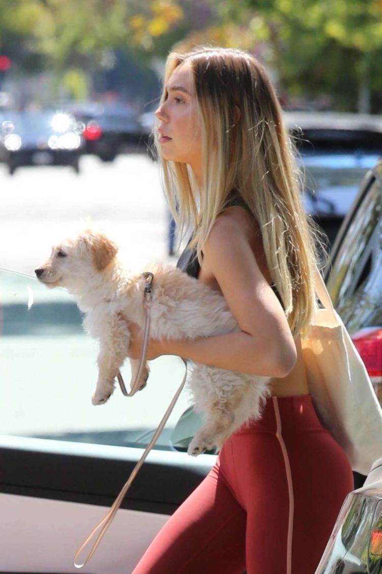 Alexis Ren Spotted After Workout Session With Her Puppy In Los Angeles
