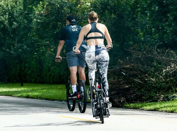 Fitness Freak Jennifer Lopez And Alex Rodriguez Training On Bikes With Their Personal Trainer