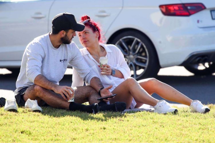 Sharna Burgess Relaxing In A While Shirt Out In Bondi