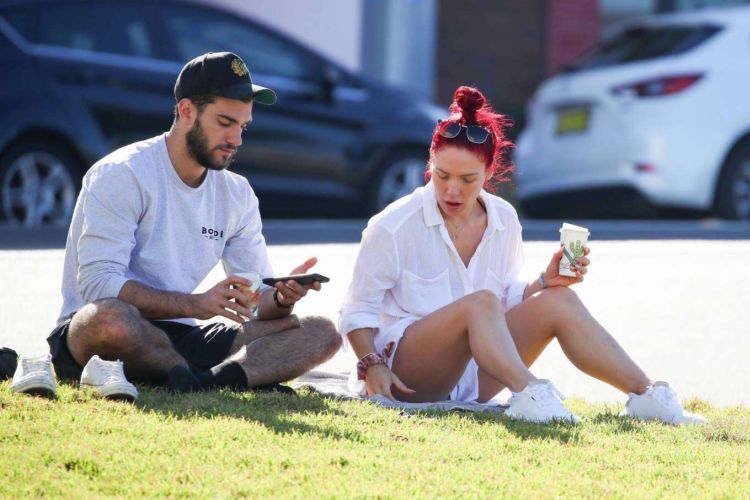 Sharna Burgess Relaxing In A While Shirt Out In Bondi