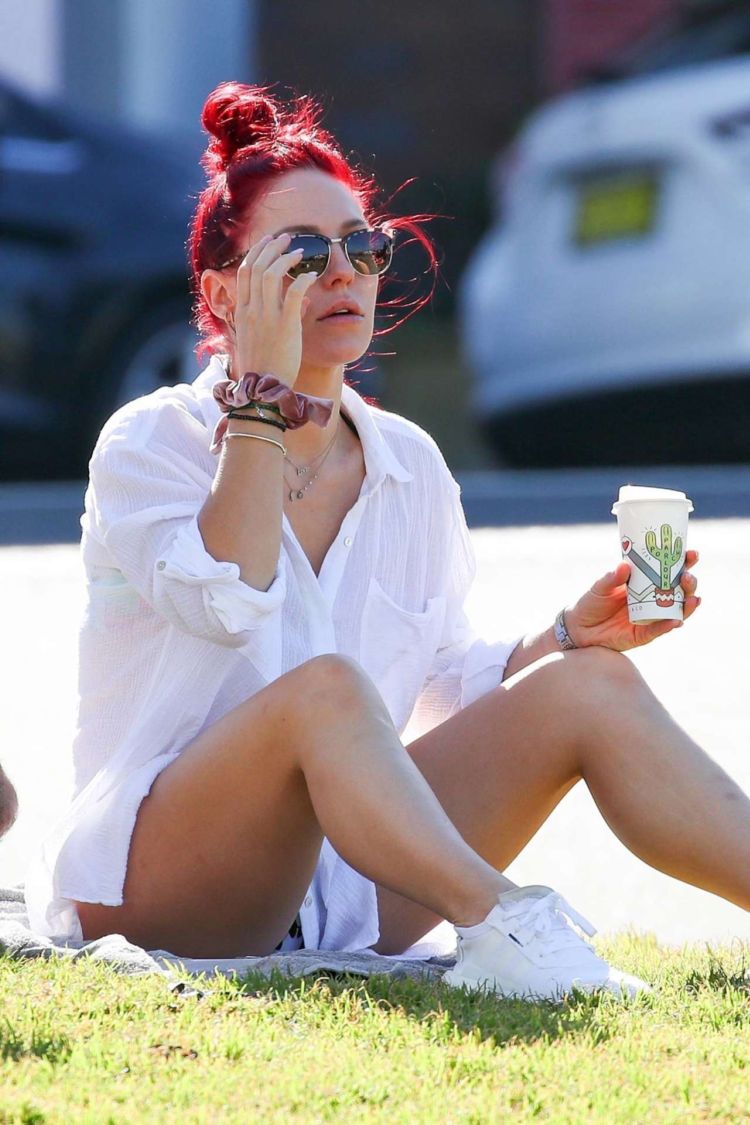 Sharna Burgess Relaxing In A While Shirt Out In Bondi
