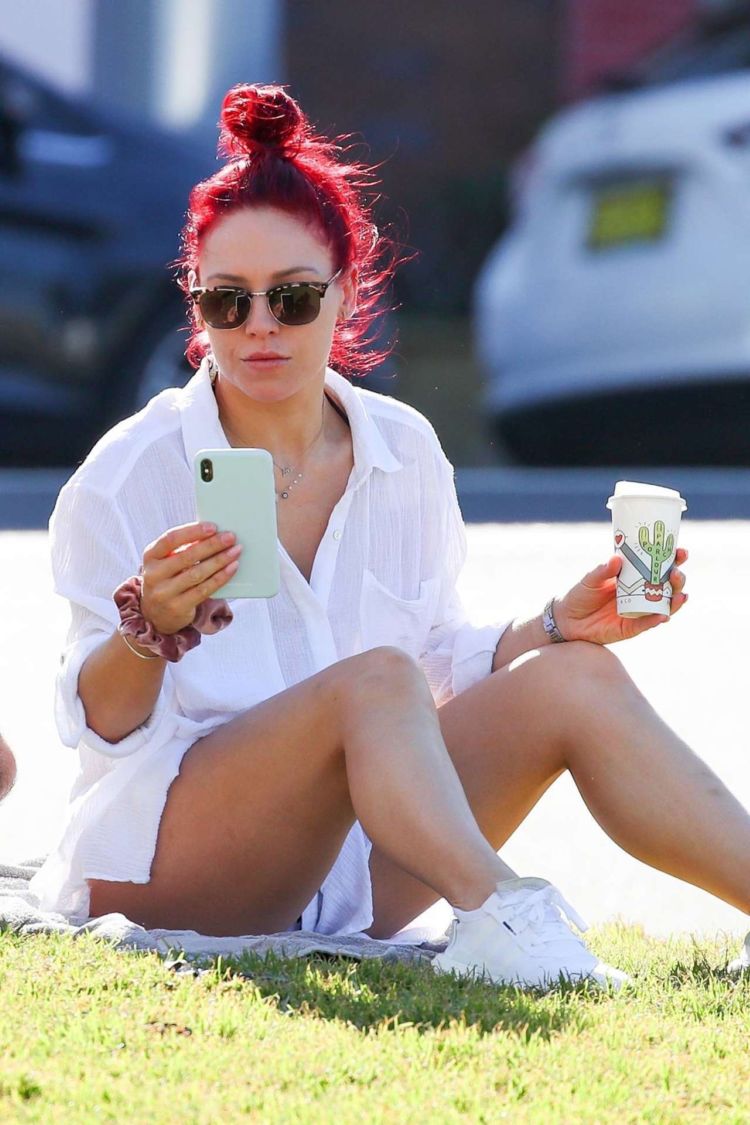 Sharna Burgess Relaxing In A While Shirt Out In Bondi
