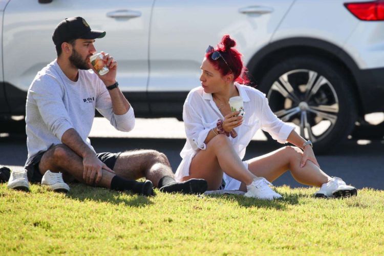 Sharna Burgess Relaxing In A While Shirt Out In Bondi