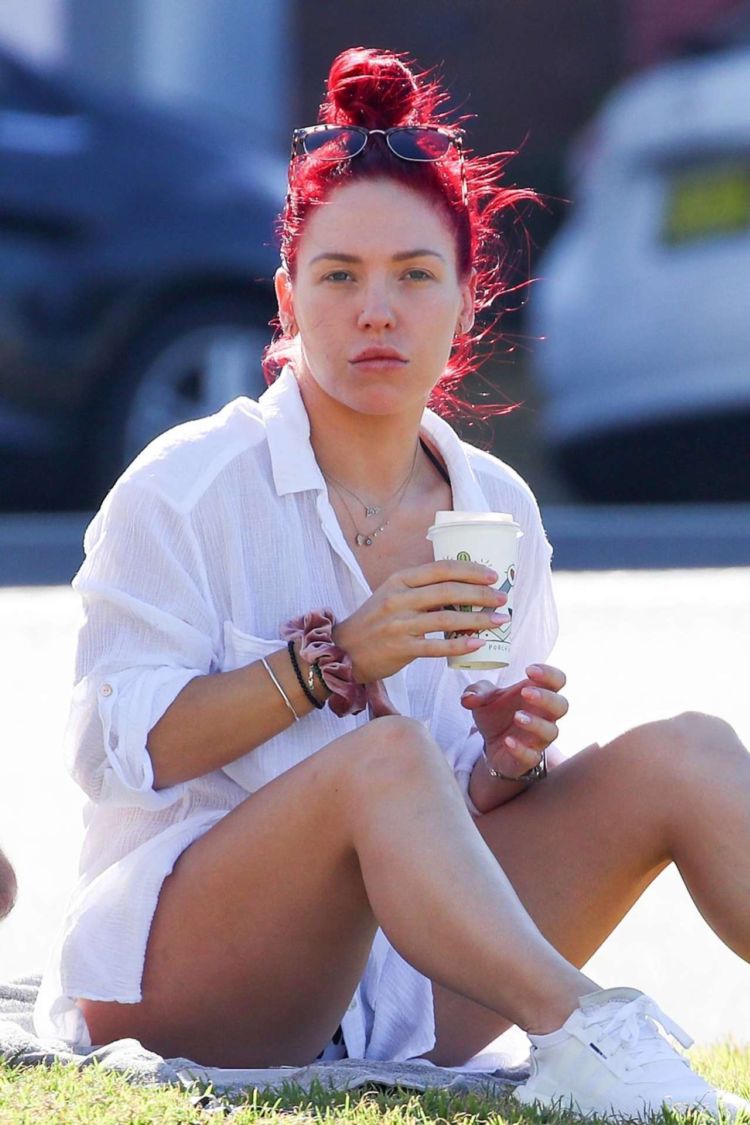 Sharna Burgess Relaxing In A While Shirt Out In Bondi