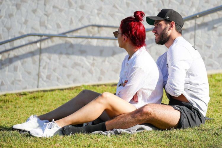 Sharna Burgess Relaxing In A While Shirt Out In Bondi