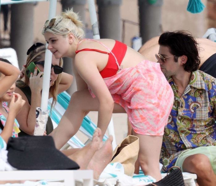 Ariel Winter Vacationing In A Red Bikini With Boyfriend Luke Benward On Laguna Beach