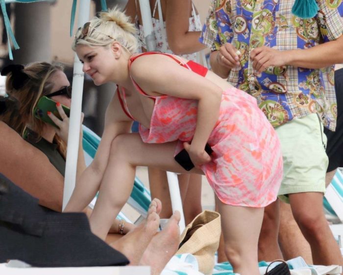 Ariel Winter Vacationing In A Red Bikini With Boyfriend Luke Benward On Laguna Beach