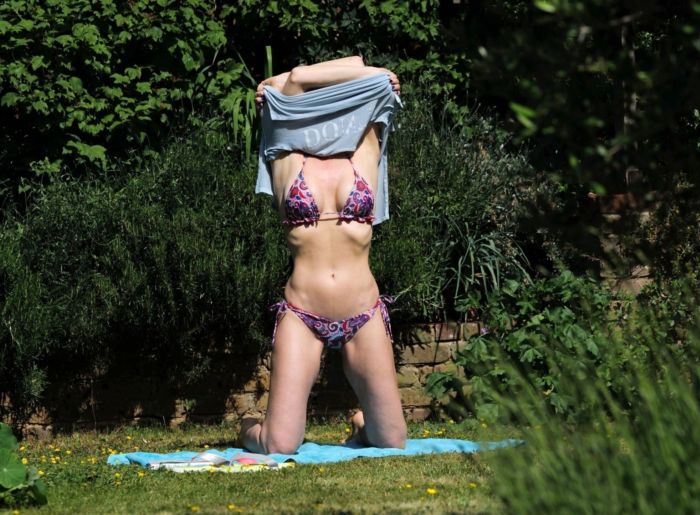 Caprice Bourret Tanning In A Three-Piece Trikini In A Park In London