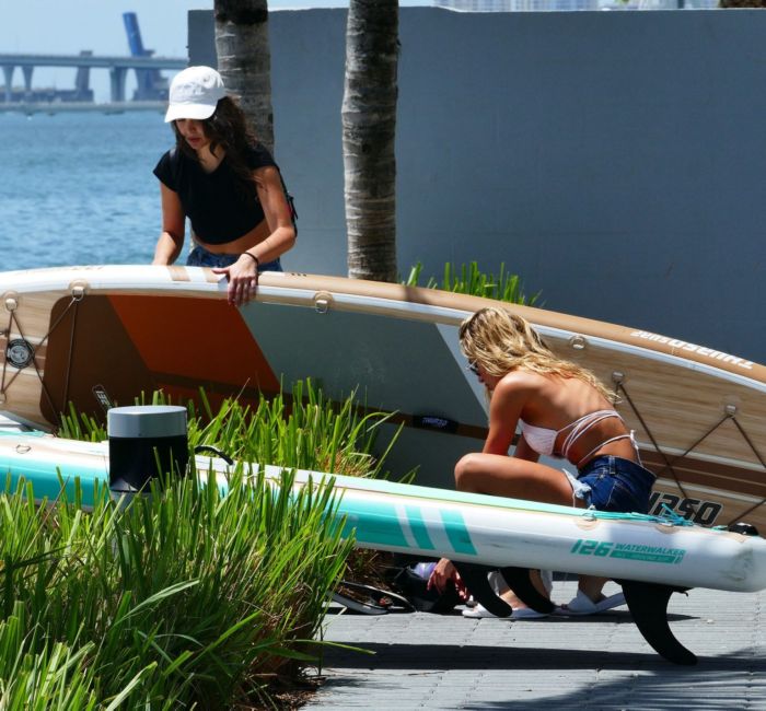 Cindy Prado And Lauren Goodman Paddleboarding In Miami