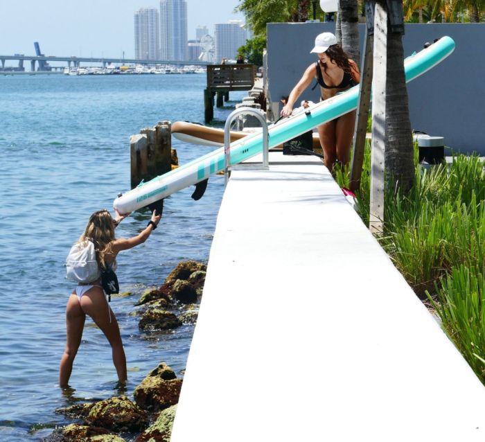 Cindy Prado And Lauren Goodman Paddleboarding In Miami
