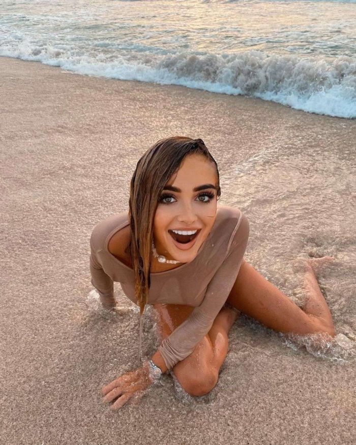 Georgia Harrison Enjoying The Ocean Waves At The Beach