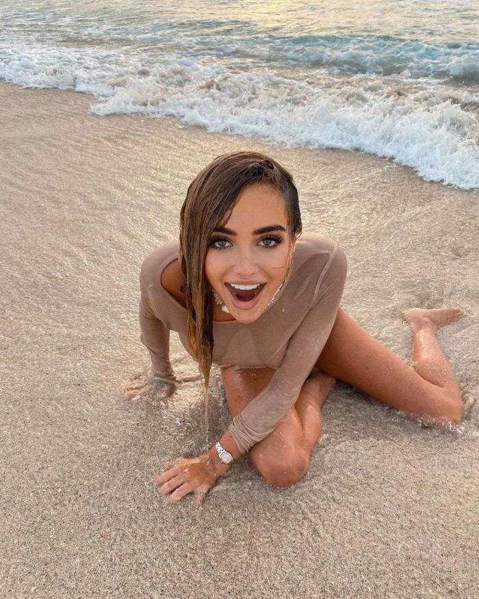 Georgia Harrison Enjoying The Ocean Waves At The Beach