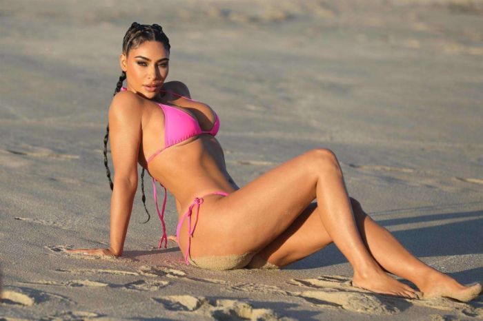 Kim Kardashian Wet In A Pink Bikini For A KKW Beauty Photoshoot