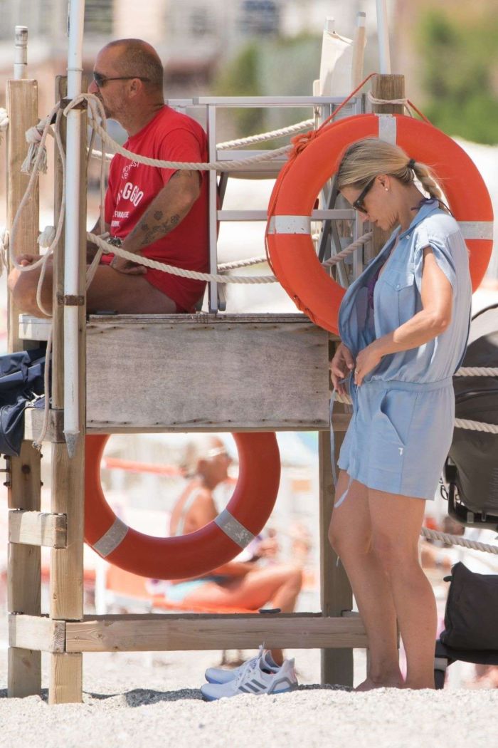 Michelle Hunziker Relaxing And Swimming In The Sea
