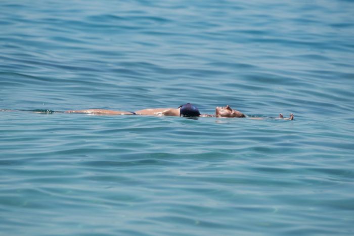 Michelle Hunziker Relaxing And Swimming In The Sea