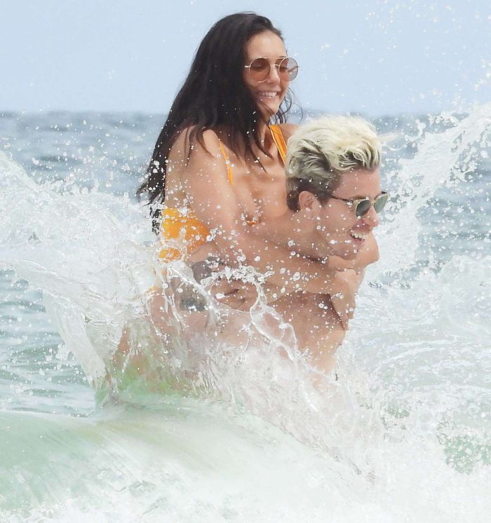 Nina Dobrev In An Orange Swimsuit With Shaun White At Tulum Beach
