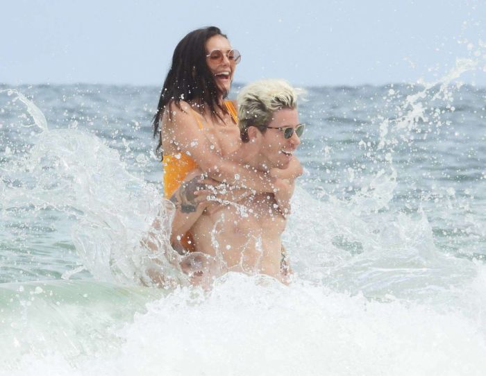 Nina Dobrev In An Orange Swimsuit With Shaun White At Tulum Beach