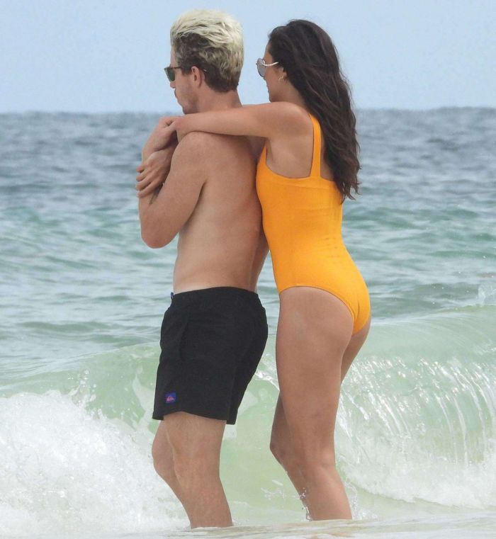 Nina Dobrev In An Orange Swimsuit With Shaun White At Tulum Beach