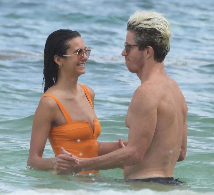 Nina Dobrev In An Orange Swimsuit With Shaun White At Tulum Beach