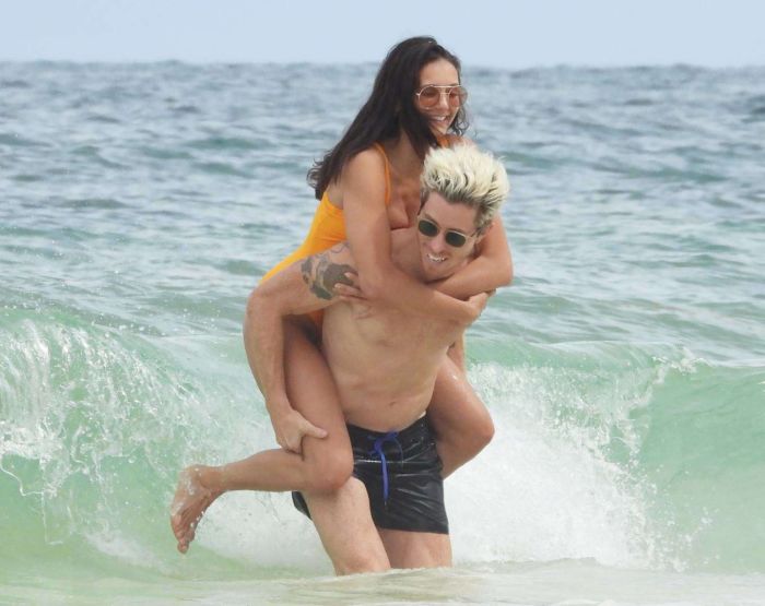 Nina Dobrev In An Orange Swimsuit With Shaun White At Tulum Beach