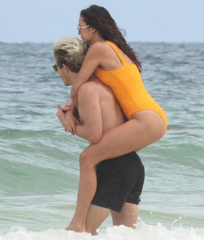 Nina Dobrev In An Orange Swimsuit With Shaun White At Tulum Beach
