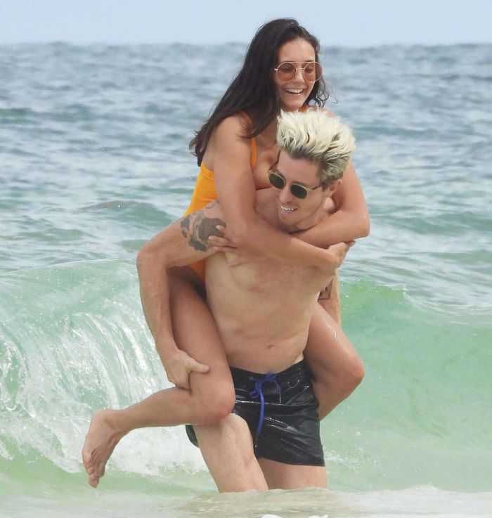 Nina Dobrev In An Orange Swimsuit With Shaun White At Tulum Beach