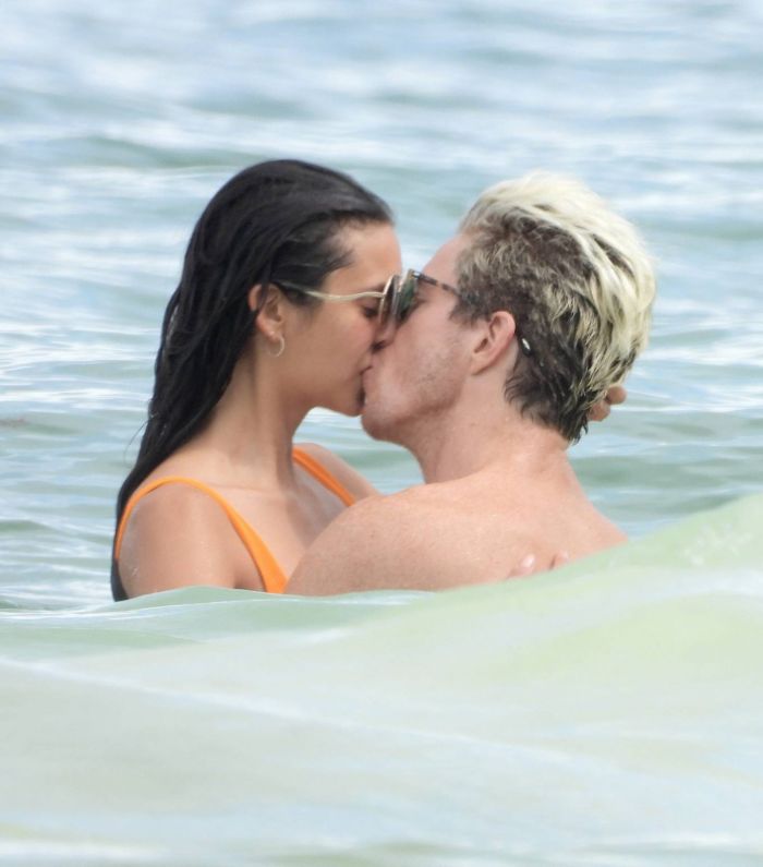 Nina Dobrev In An Orange Swimsuit With Shaun White At Tulum Beach