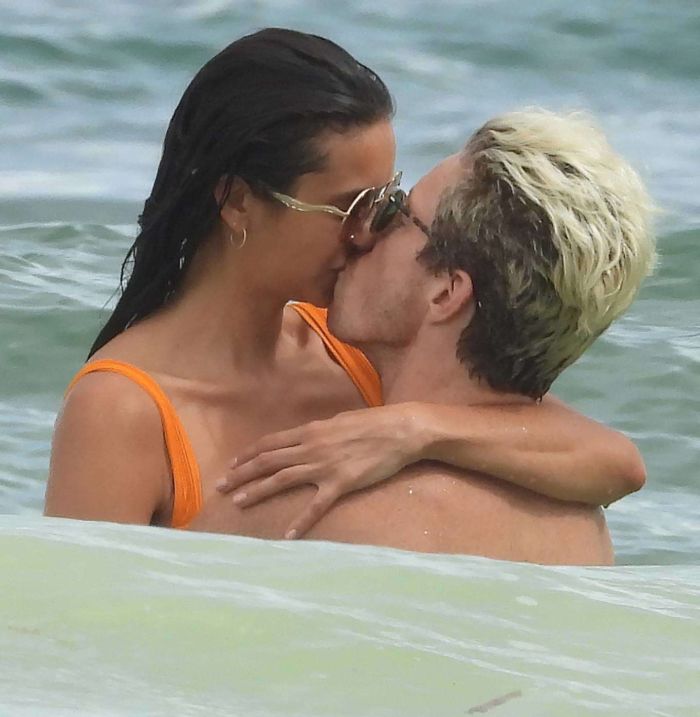 Nina Dobrev In An Orange Swimsuit With Shaun White At Tulum Beach