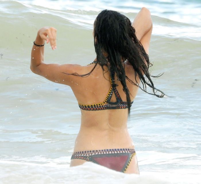 Nina Dobrev In An Orange Swimsuit With Shaun White At Tulum Beach