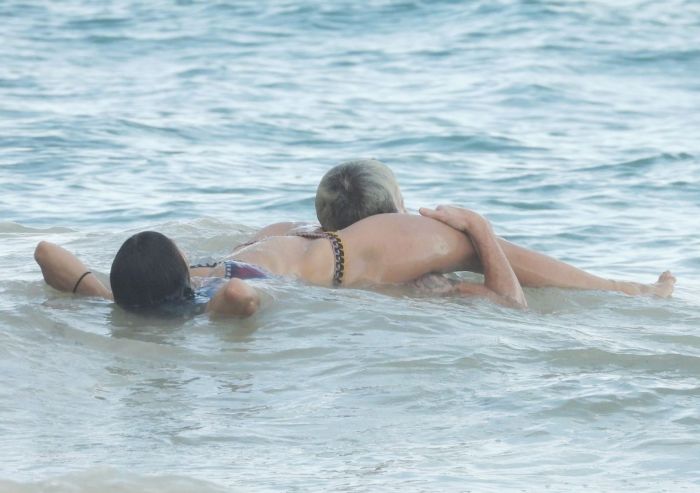 Nina Dobrev In An Orange Swimsuit With Shaun White At Tulum Beach