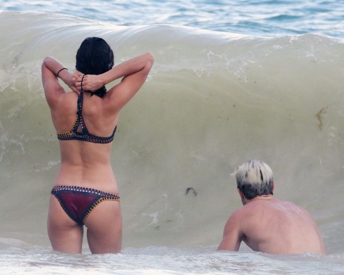 Nina Dobrev In An Orange Swimsuit With Shaun White At Tulum Beach