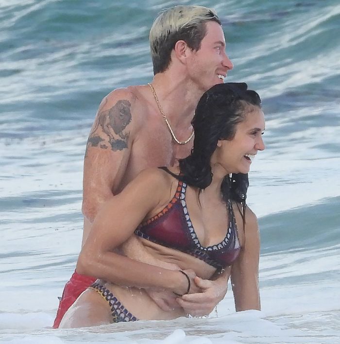 Nina Dobrev In An Orange Swimsuit With Shaun White At Tulum Beach
