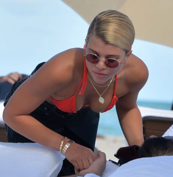 Sofia Richie On A Vacation In Orange Bikini Top At The Beach