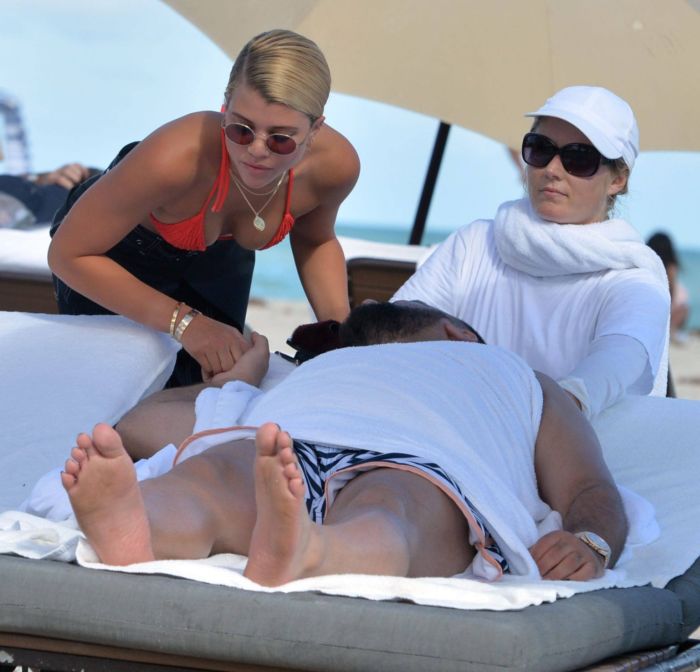 Sofia Richie On A Vacation In Orange Bikini Top At The Beach